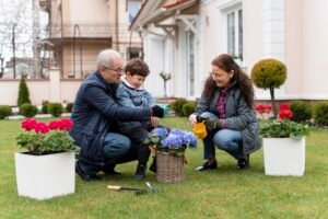 grandparents little boy working garden