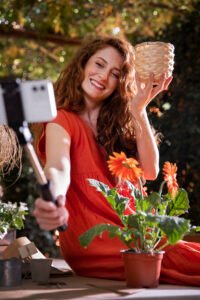medium shot influencer taking selfie
